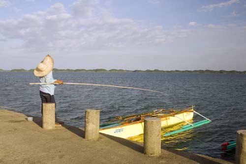 fishing from pier-AsiaPhotoStock