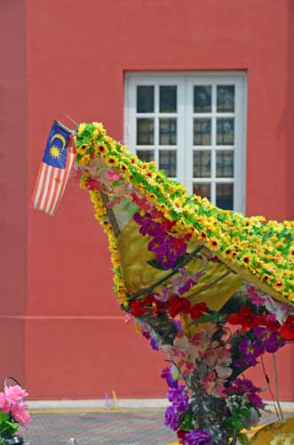 flag on trishaw-AsiaPhotoStock