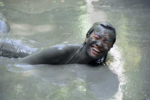 fun in the mud-AsiaPhotoStock