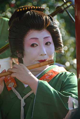 geisha playing flute-AsiaPhotoStock