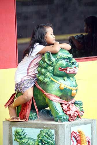 girl lion-AsiaPhotoStock