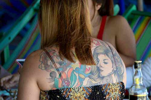 girl tattoo-AsiaPhotoStock