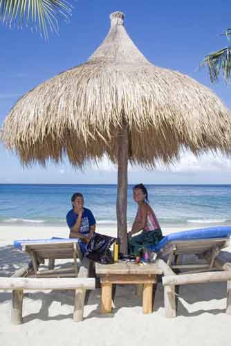 girls on beach chair-AsiaPhotoStock