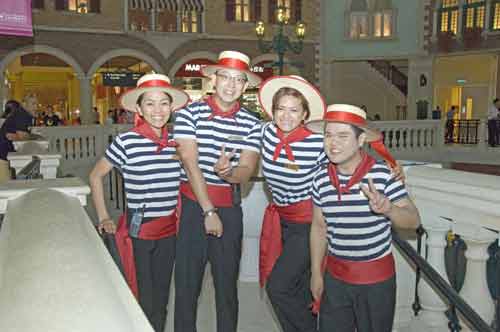 gondoliers at venetian-AsiaPhotoStock