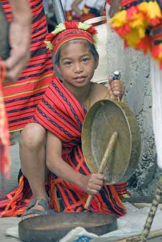 gong playing boy-AsiaPhotoStock