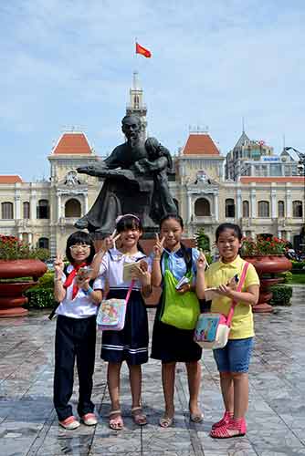 group at statue-AsiaPhotoStock