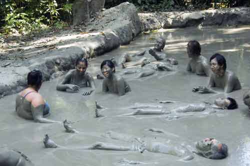 media group in the mud-AsiaPhotoStock