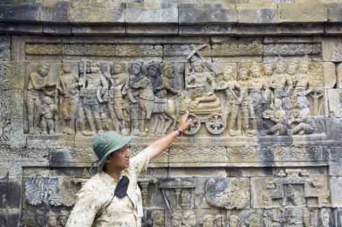 guide at borobudur-AsiaPhotoStock