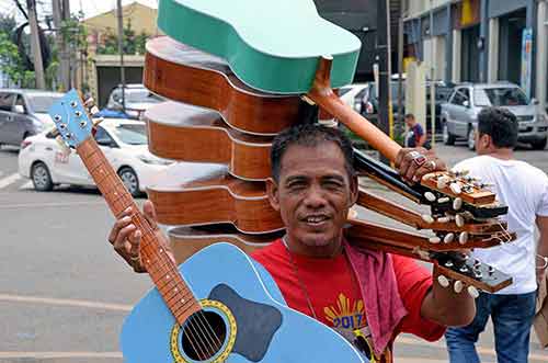 guitar man in cebu-AsiaPhotoStock