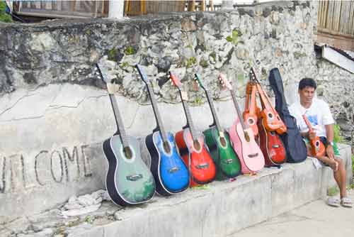 guitars on wall-AsiaPhotoStock