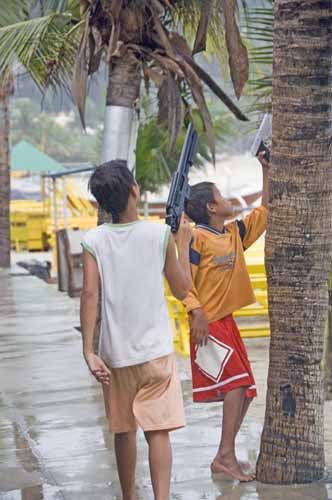 boys with guns-AsiaPhotoStock