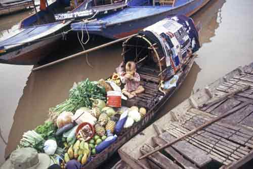 kid in boat-AsiaPhotoStock