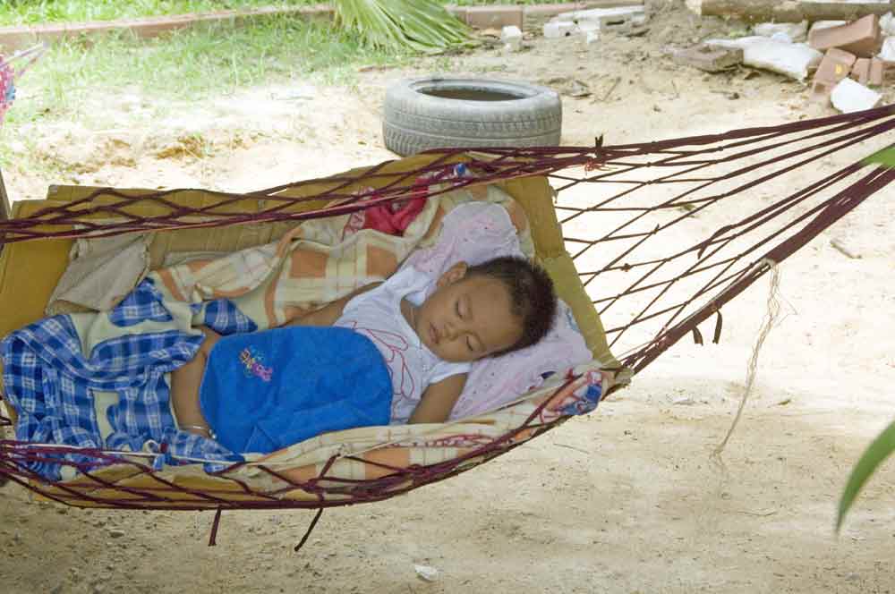 sleeping in hammock-AsiaPhotoStock