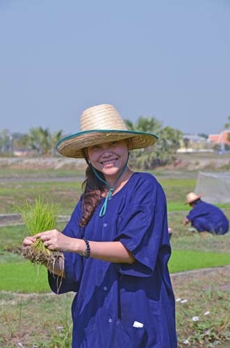 happy farmer with rice-AsiaPhotoStock