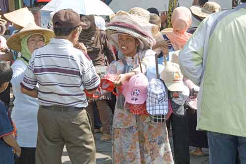 hat vendors tourists-AsiaPhotoStock