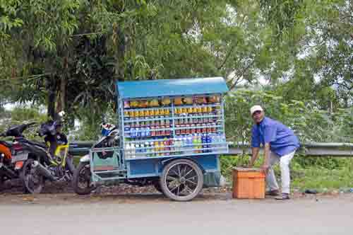 hawker with cart-AsiaPhotoStock
