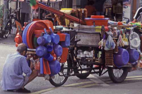 hawker with bike-AsiaPhotoStock