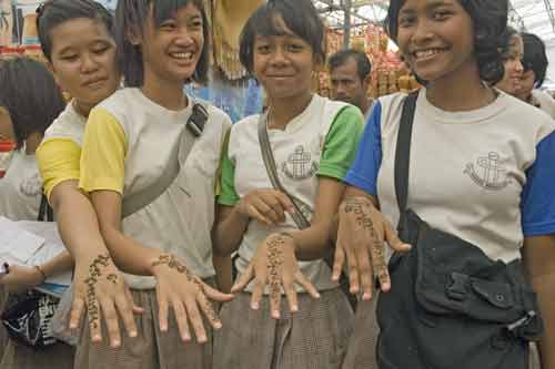 girls with henna-AsiaPhotoStock