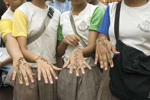 hands with henna-AsiaPhotoStock