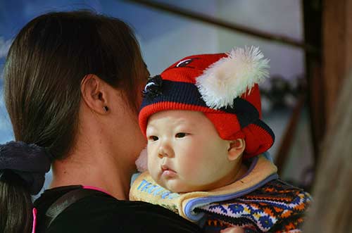 hmong red hat-AsiaPhotoStock