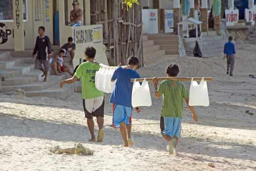 delivering bags of ice-AsiaPhotoStock