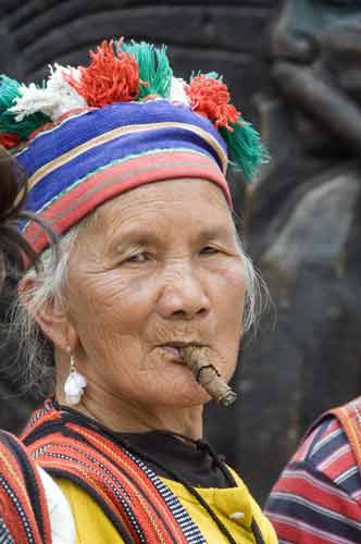 igorot lady and cigar-AsiaPhotoStock