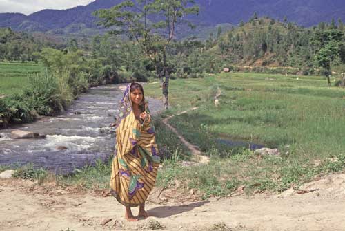 girl by river-AsiaPhotoStock