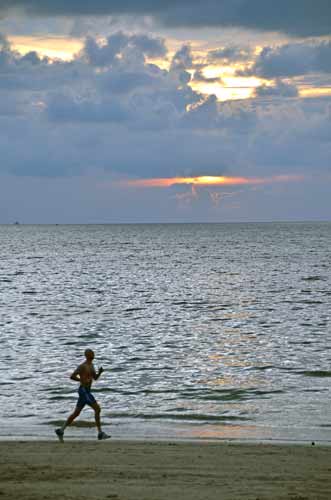 jog patong beach-AsiaPhotoStock