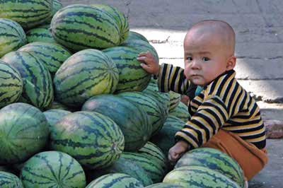 boy with watermelons-AsiaPhotoStock