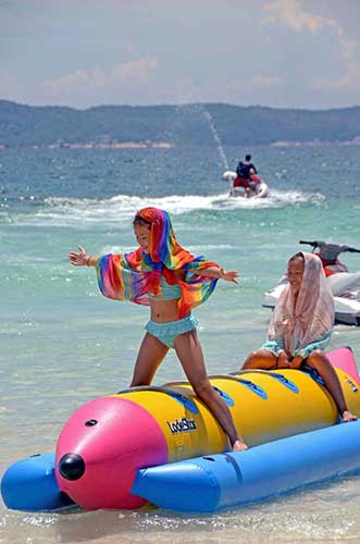 kids banana boat-AsiaPhotoStock