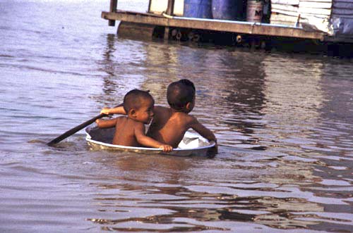 kids sailing in bowl-AsiaPhotoStock