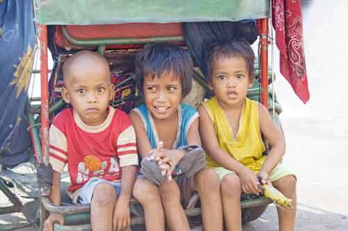 tricycle threesome-AsiaPhotoStock