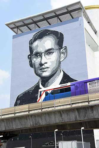 king mural and sky train-AsiaPhotoStock