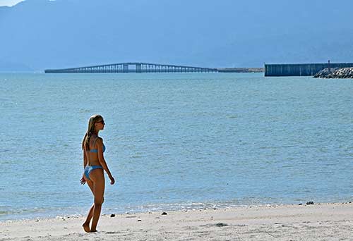 lady and bridge-AsiaPhotoStock