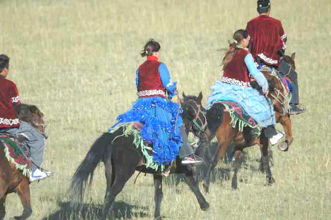 lady horseriders-AsiaPhotoStock