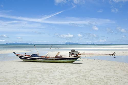 long tail boat on beach-AsiaPhotoStock