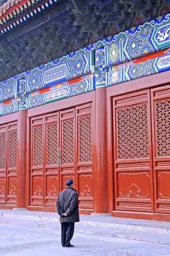 man and red door-AsiaPhotoStock