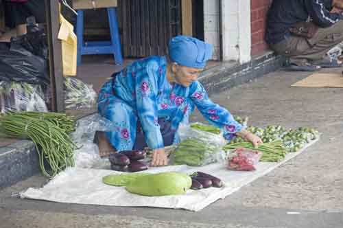 lady in blue at market-AsiaPhotoStock