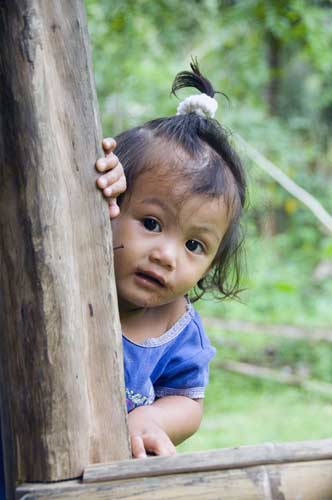 mangyan child peeping-AsiaPhotoStock