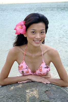 model with flower in hair-AsiaPhotoStock