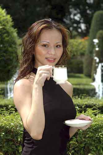 model drinking tea-AsiaPhotoStock