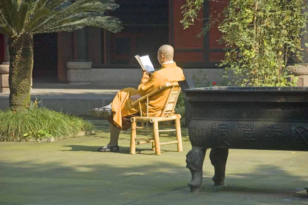 monk reading-AsiaPhotoStock