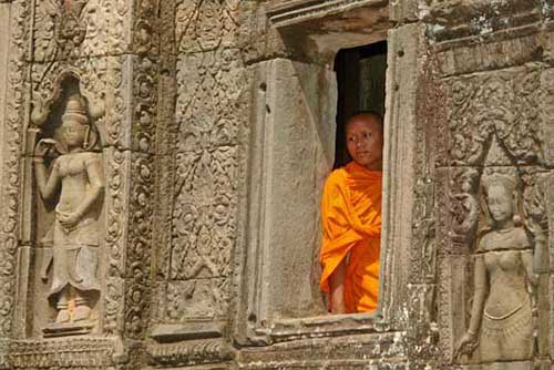 monk at window-AsiaPhotoStock