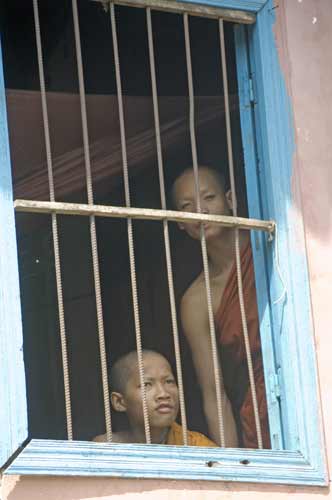 monks at window-AsiaPhotoStock