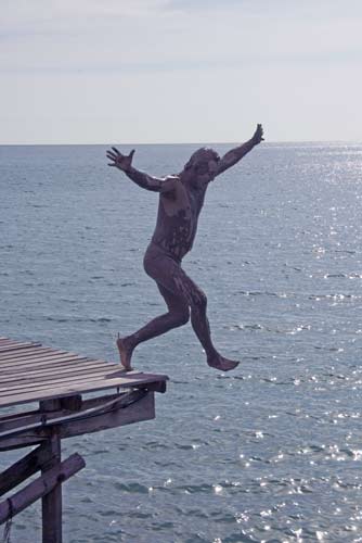 jumps off pier-AsiaPhotoStock