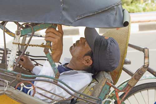 napping becak driver-AsiaPhotoStock