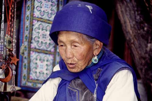 naxi lady in blue-AsiaPhotoStock