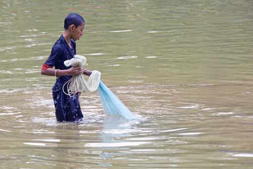 pulling in the net-AsiaPhotoStock