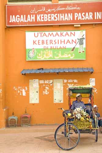 pedicab at market-AsiaPhotoStock