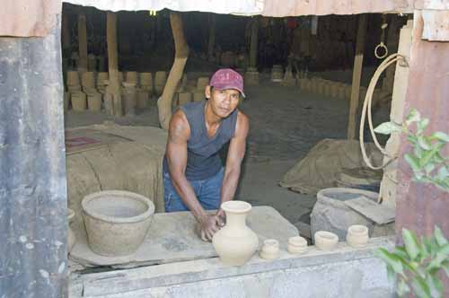 turning clay-AsiaPhotoStock